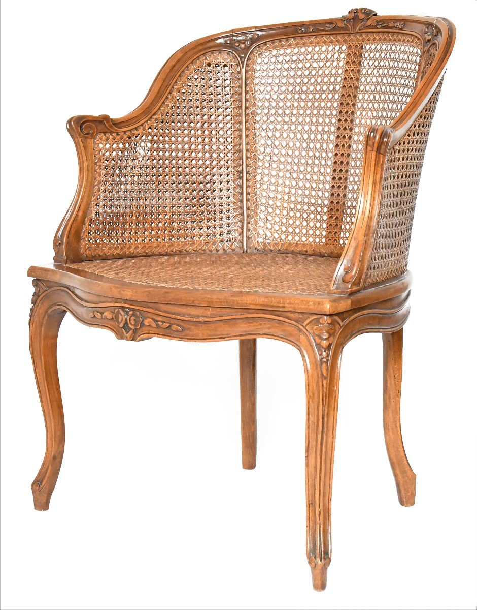 Fauteuil bergère canné de style Louis XV 