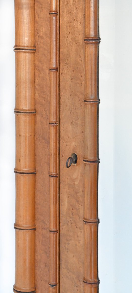 Armoire en bois sculpté façon bambou-photo-4