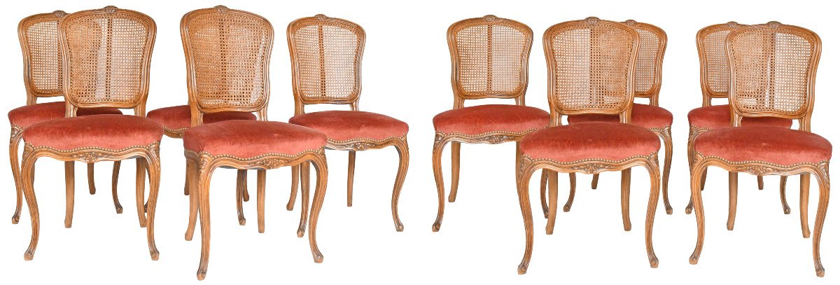 Suite de 10 chaises de style Louis XV à dossier canné