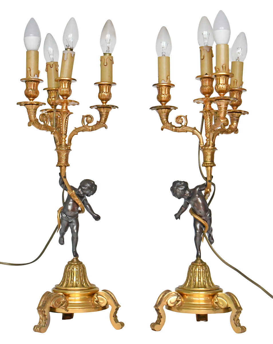 Pair Of Bronze Candelabra Decorated With Putti Supporting Cornucopias