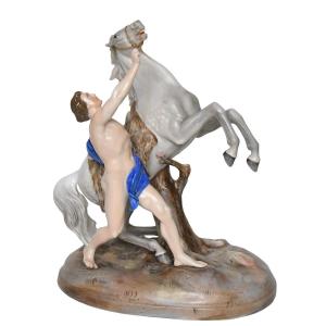 Porcelain Group Representing A Man With A Rearing Horse