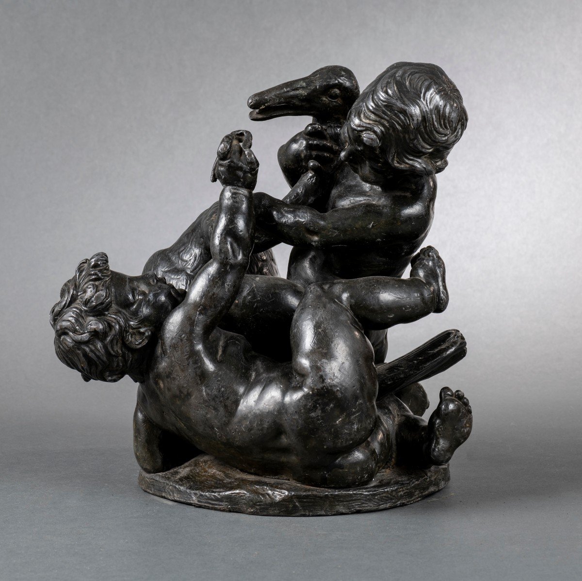 Group Of Putti Fighting A Swan In Patinated Lead Attributed To Barthelemy Guibal (1699-1757)