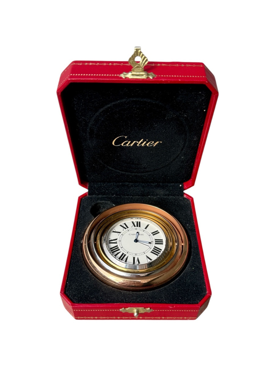 CARTIER - Pendulette de voyage modèle Trinity, dans son écrin d'origine, très bon état. 