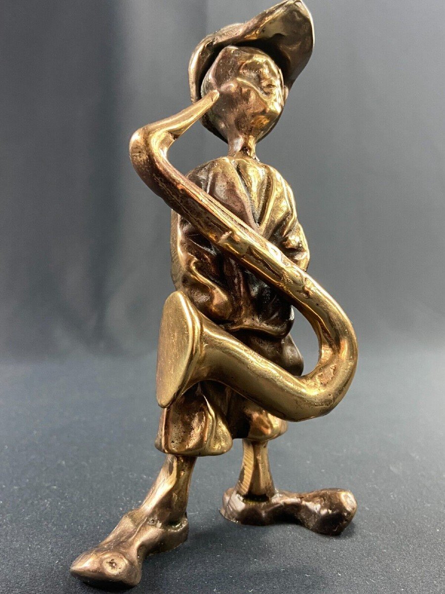 Sculpted Subject Of A Young Musician Saxophone In Bronze Signed Yves Lohé