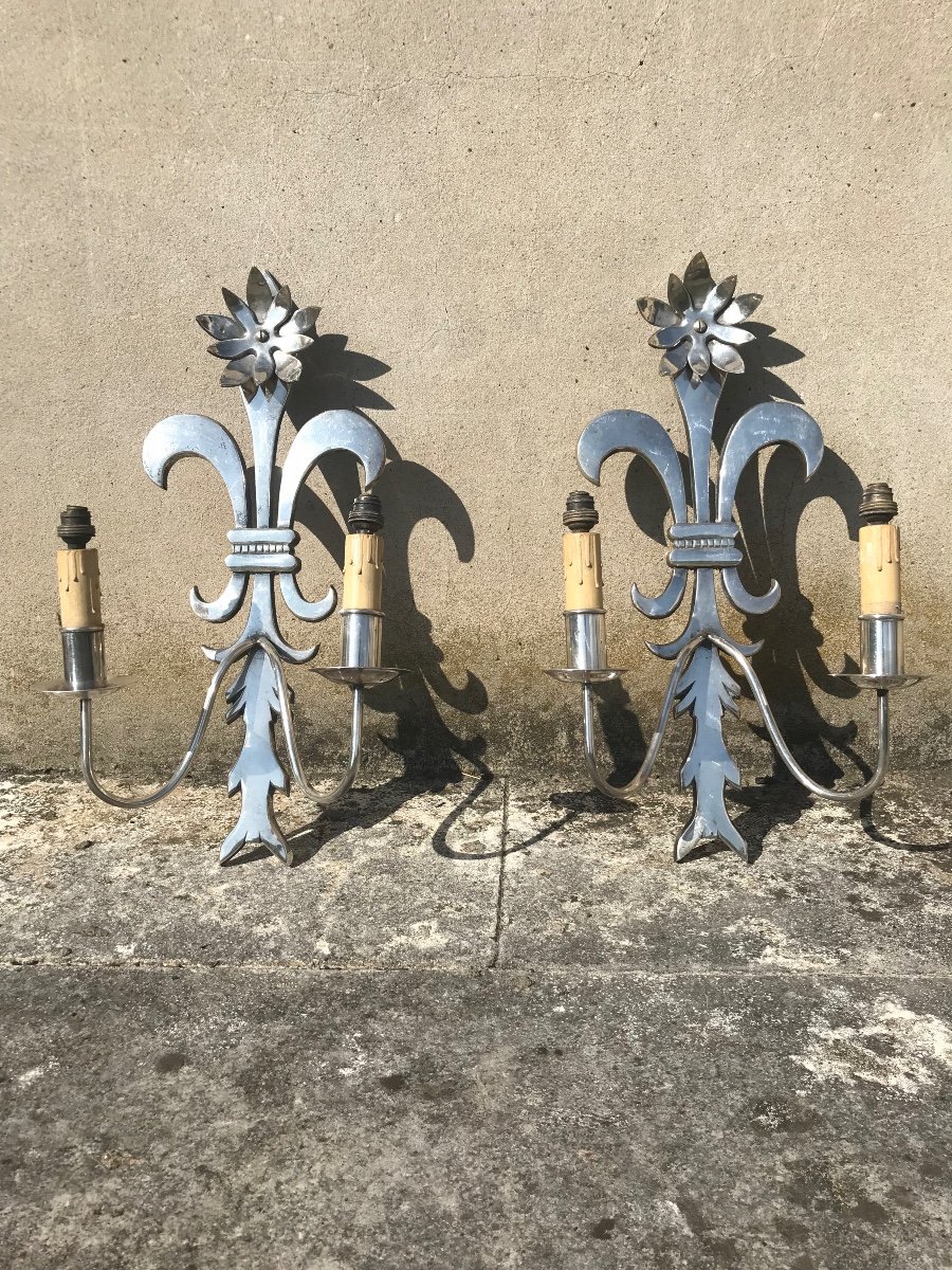 Pair Of Fleur De Lys Wall Lights.