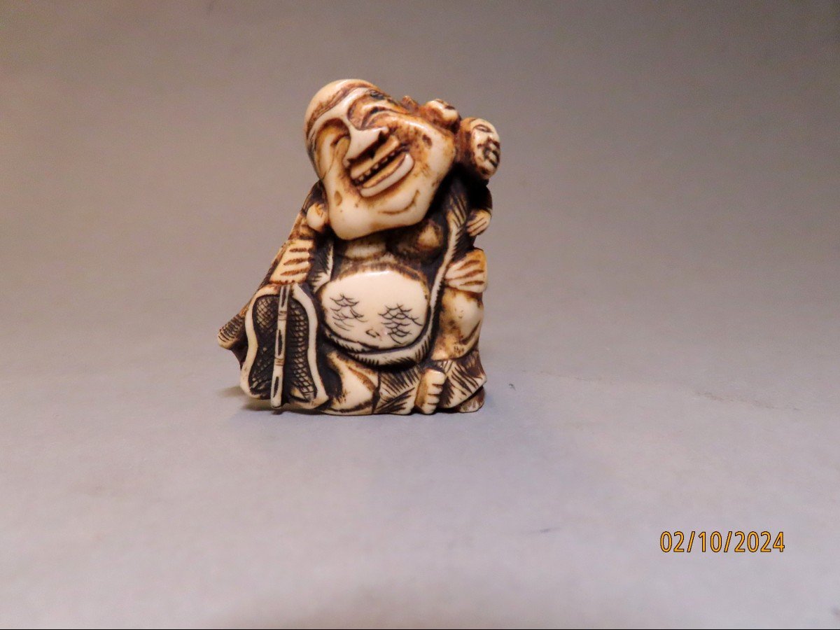 Ivory Netsuke. Laughing Hotei. Japan Meiji Period (1868-1912)