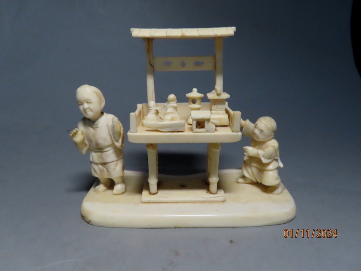 Ivory Okimono. Karako And Toys. Signed Shin'yuki' 心之 . Japan Meiji Period (1868-1912)