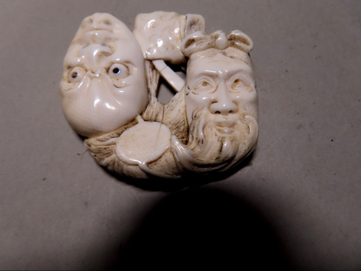 Ivory Netsuke. Two Nô, Jô Masks. Meiji Japan.