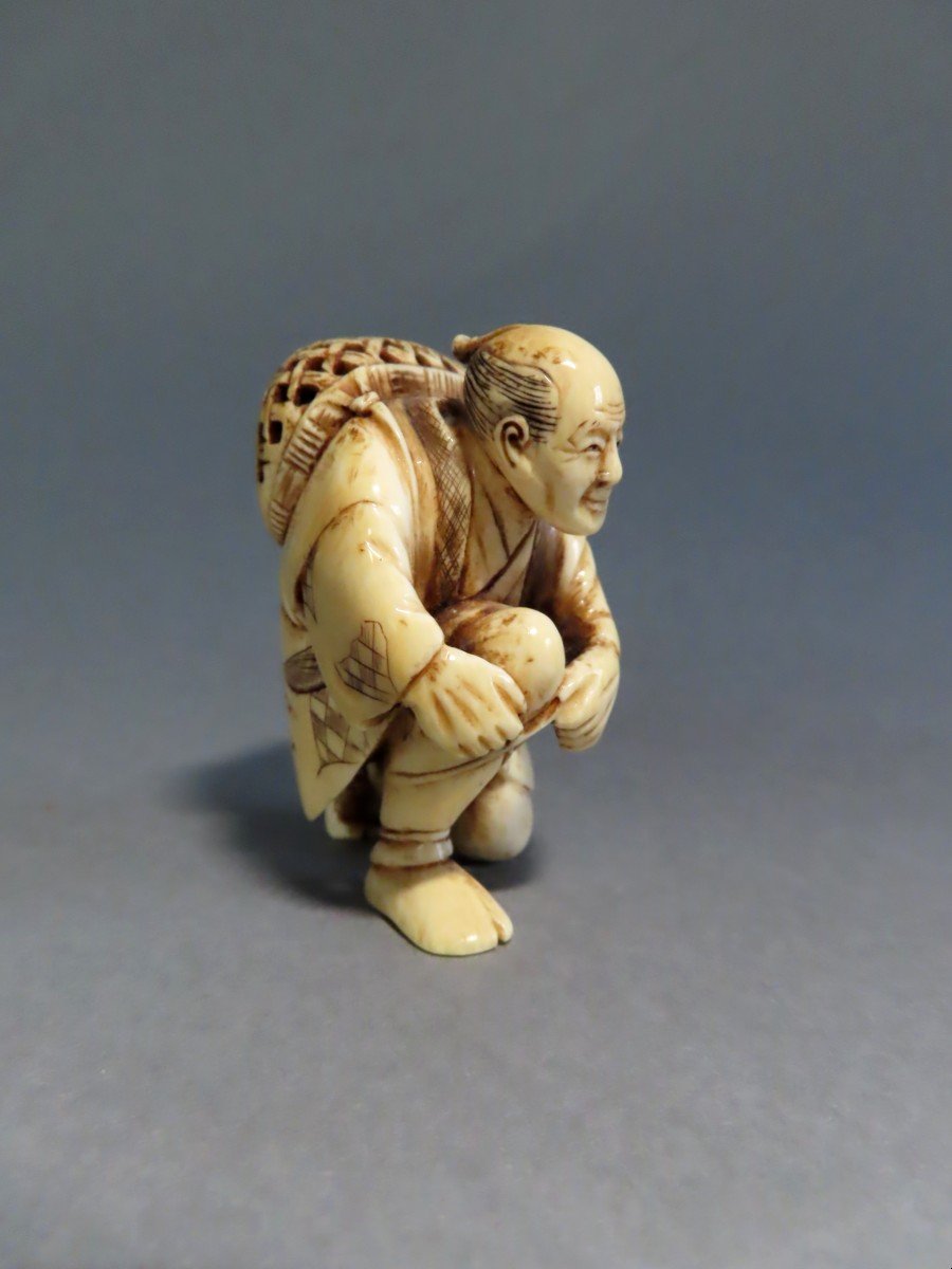 Ivory Okimono. Fisherman Retying His Shoelace. Japan, Meiji Period (1868-1912)