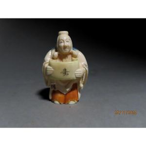 Ivory Netsuke. Notable In The Kakemono. Japan Taisho Period (1912-1928)