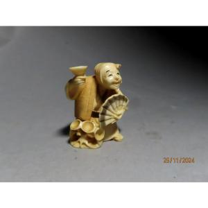 Ivory Netsuke. The Sake Drinker. Japan Taisho Period (1912-1928)