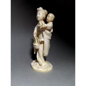 Ivory Okimono. Young Woman With Karako. Signed Yoshiaki, Japan Meiji Period (1868-1912)