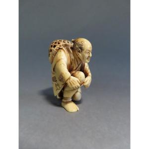 Ivory Okimono. Fisherman Retying His Shoelace. Japan, Meiji Period (1868-1912)