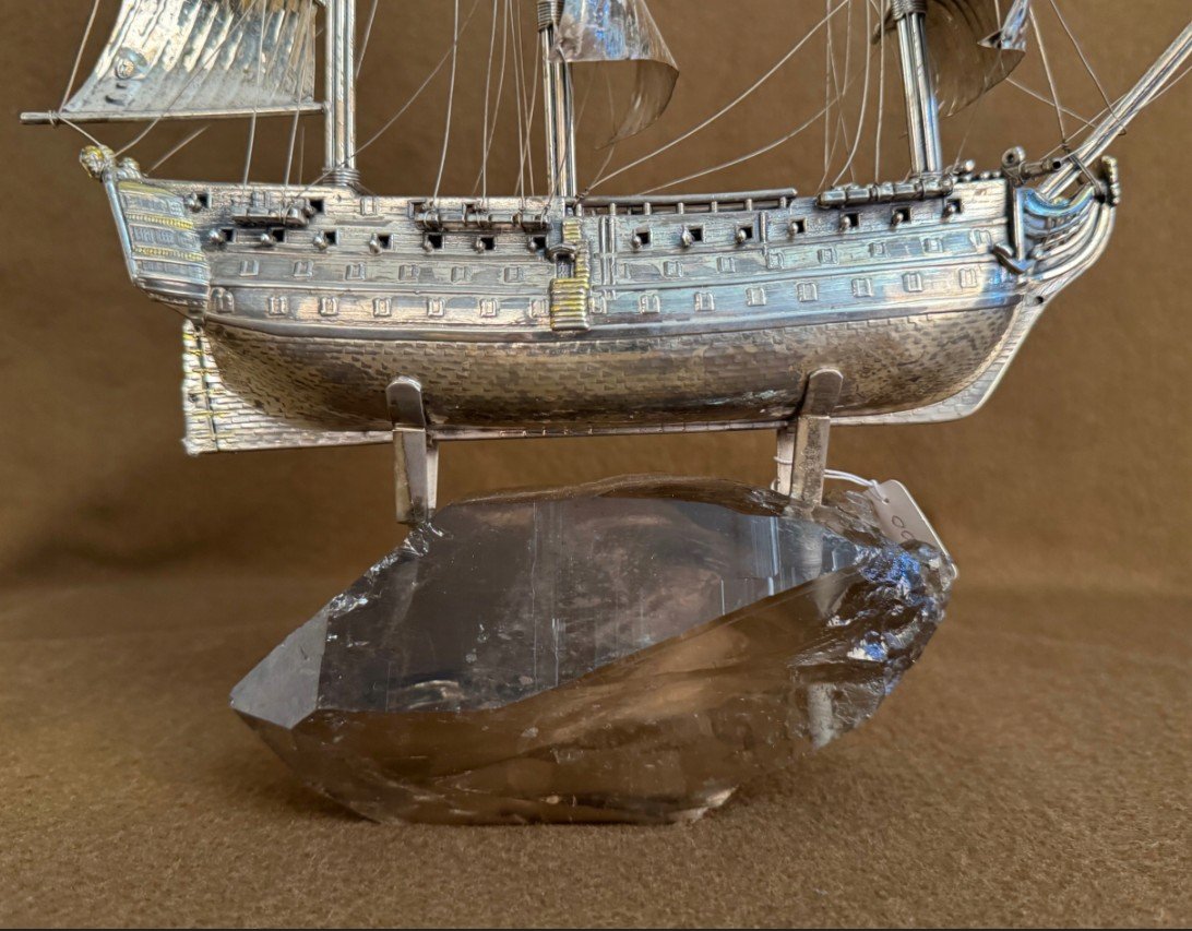 Silver Boat On Stone-photo-3