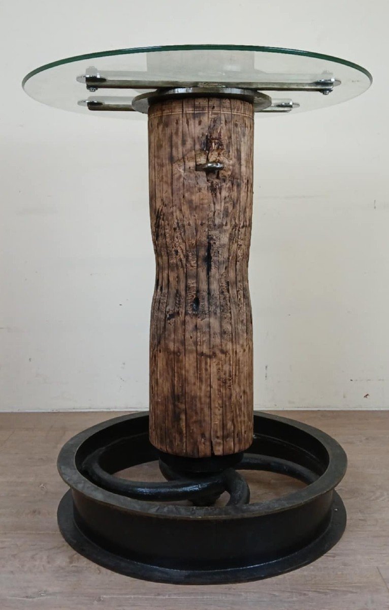 Industrial Design For This High Table Made With An Old Pulley And A Wooden Axle 