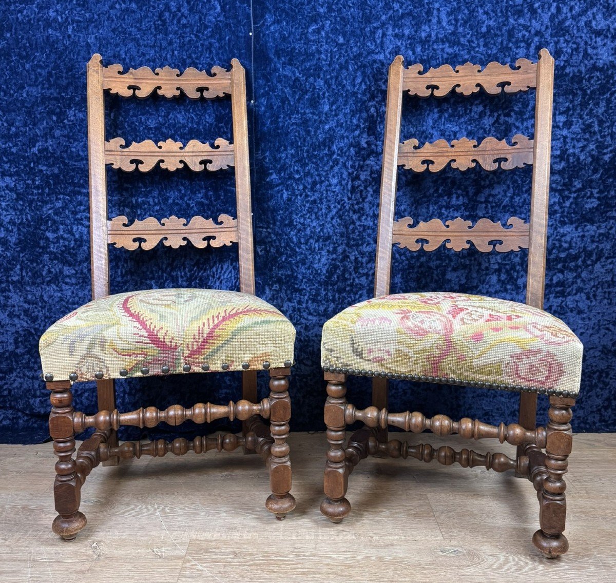 Pair Of Renaissance Style Walnut Chairs With Sloping Backs