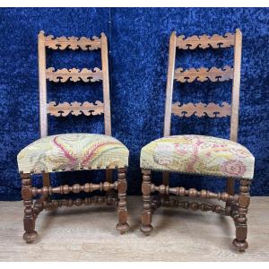 Pair Of Renaissance Style Walnut Chairs With Sloping Backs