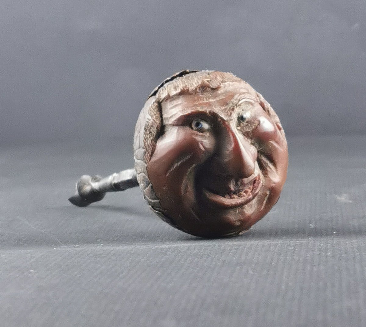 Grotesque Carved In A Brown Forming Corkscrew