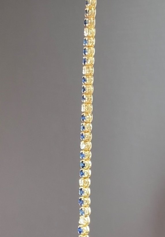 Tennis Bracelet In 14k Yellow Gold Sapphires And Diamonds-photo-4