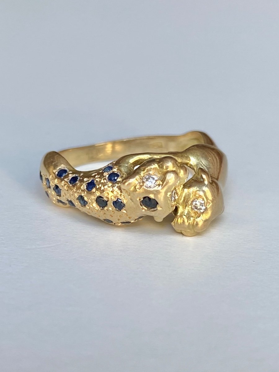 18k Yellow Gold Ring Representing The Union Of Two Panthers.-photo-2