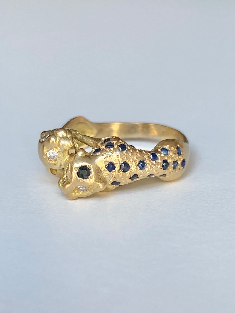 18k Yellow Gold Ring Representing The Union Of Two Panthers.-photo-3