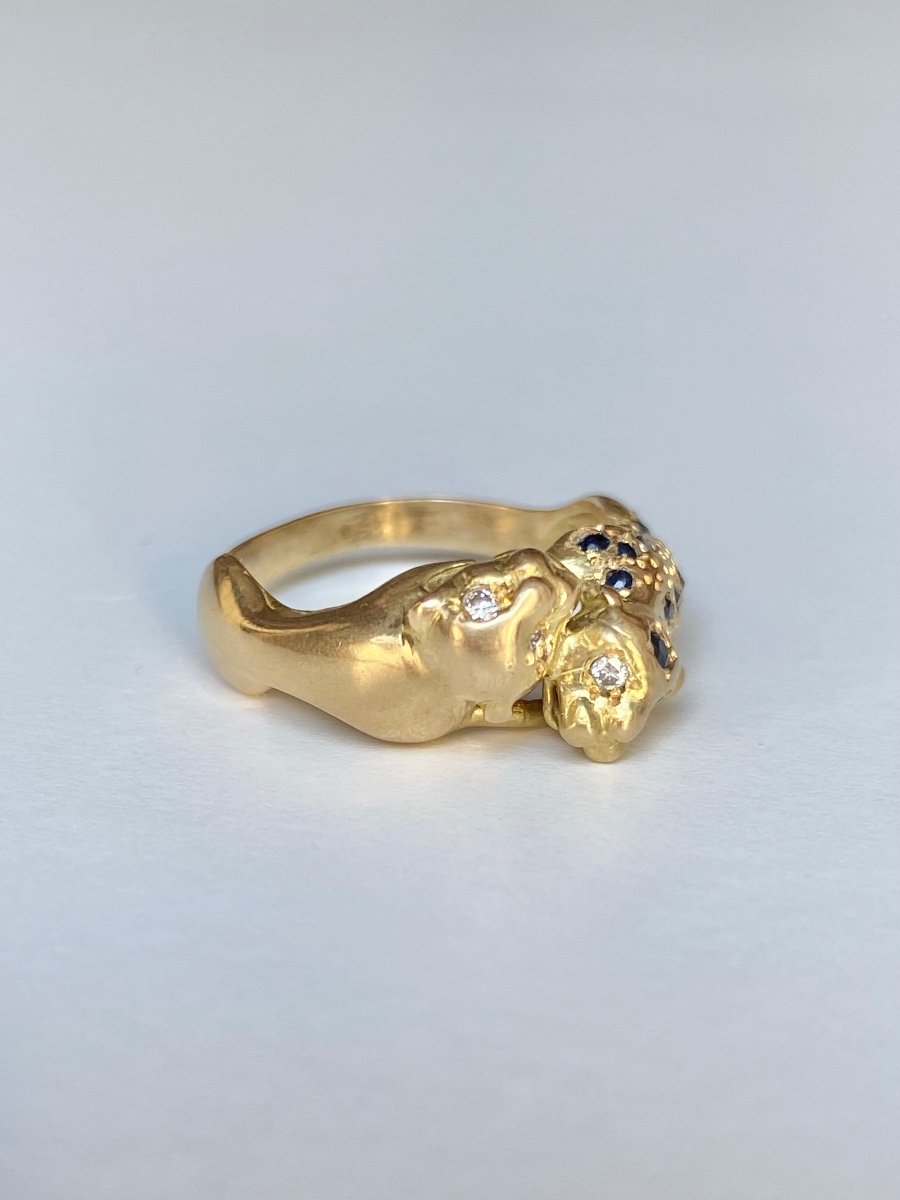 18k Yellow Gold Ring Representing The Union Of Two Panthers.-photo-1