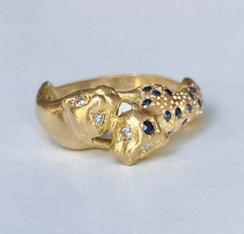 18k Yellow Gold Ring Representing The Union Of Two Panthers.