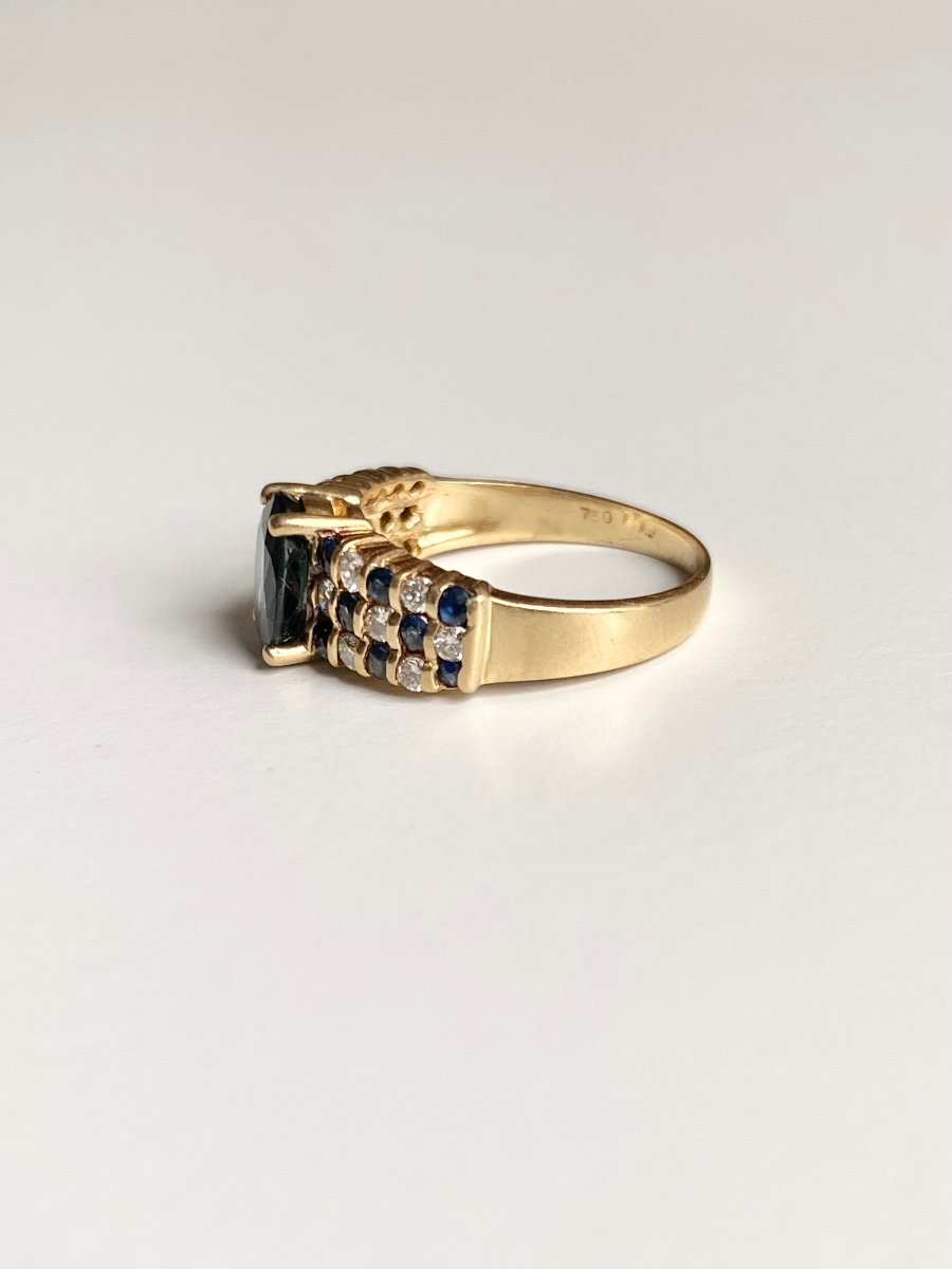 18k Yellow Gold Ring Set With A Sapphire -photo-3