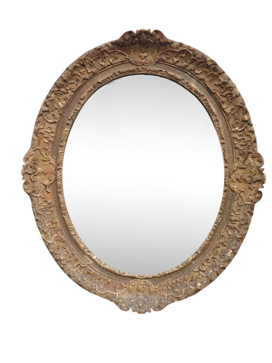 Large Oval Mirror In Carved And Gilded Oak, Louis XV Period, 18th Century