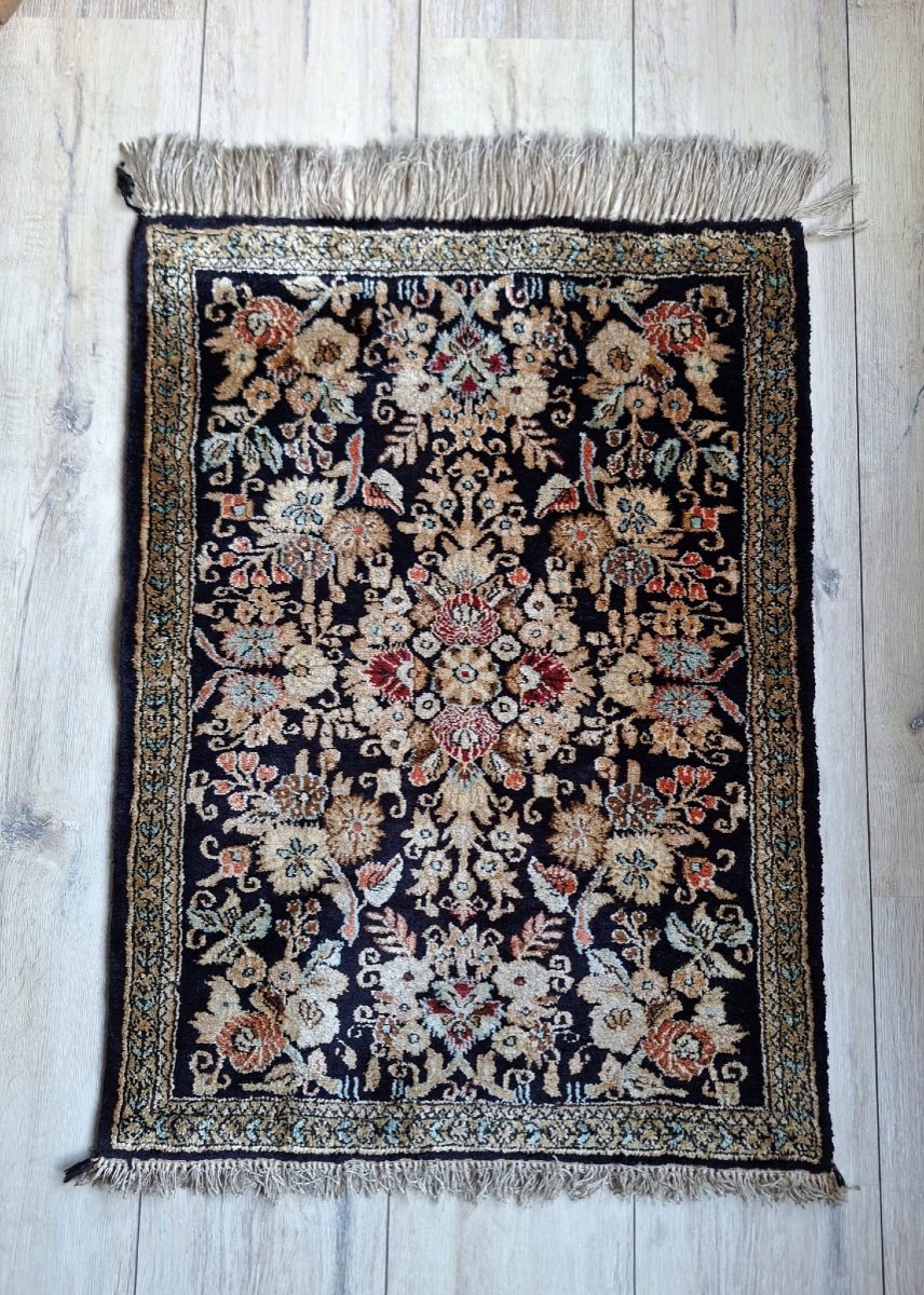 A Small Vintage Hand Knotted Ghoum Rug