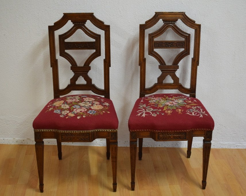 A Pair Of Louis XVI Style Chairs