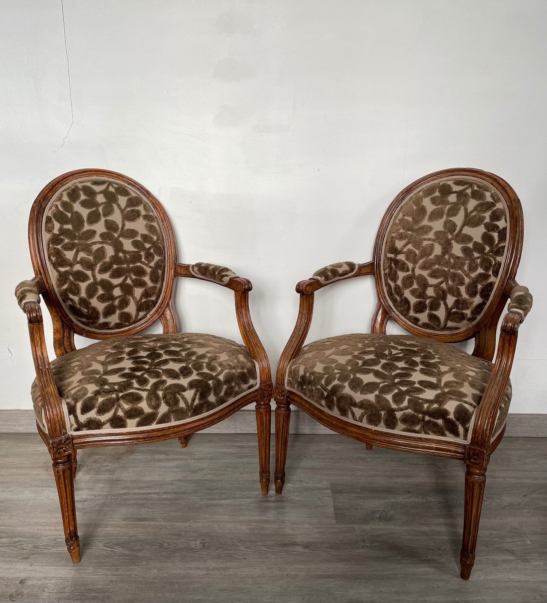 Pair Of Louis XVI Medallion Armchairs In Walnut