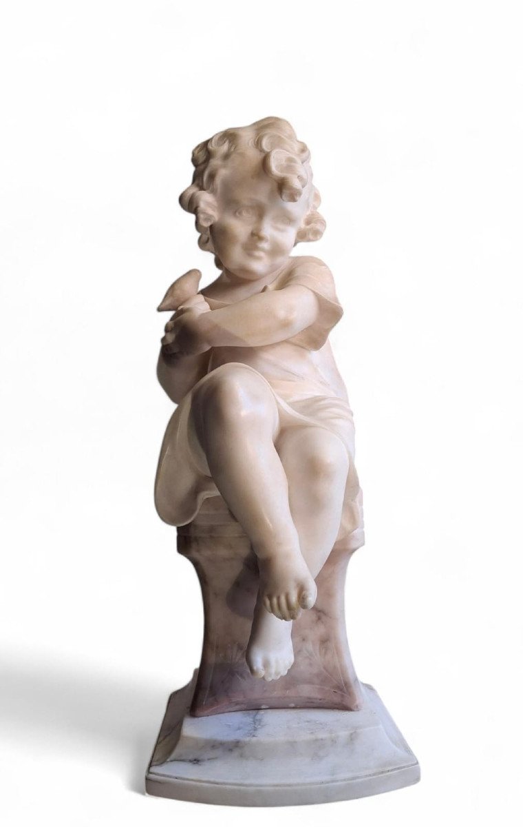 Sculpture Depicting A Little Girl With A Bird