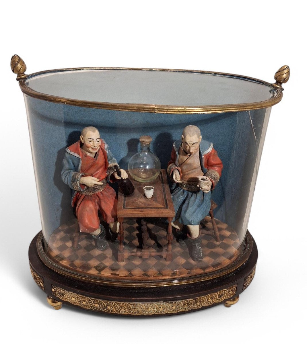 Group Of Two Magots Depicted Seated Around A Wooden Table-photo-2