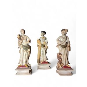 Three Sculptures Depicting Three Seasons