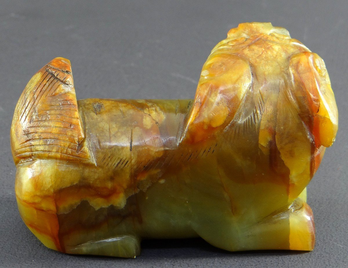 China, First Half Of The 20th Century, Small Buddhist Lion Statuette In Carved Jade. -photo-3