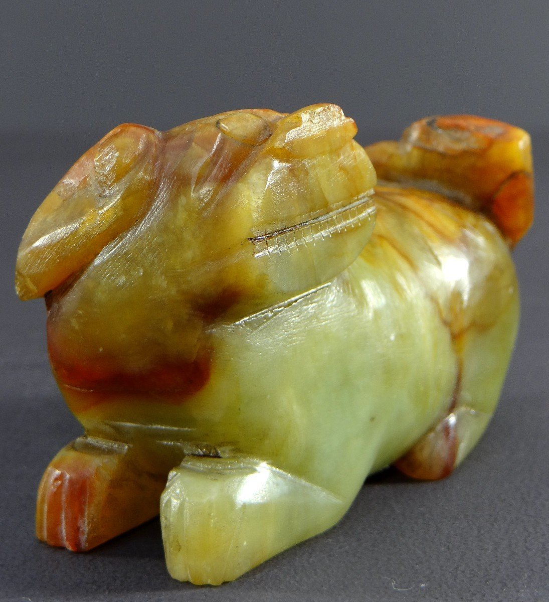 China, First Half Of The 20th Century, Small Buddhist Lion Statuette In Carved Jade. -photo-4