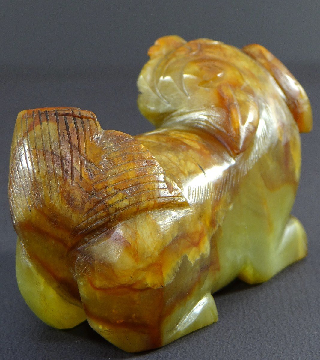 China, First Half Of The 20th Century, Small Buddhist Lion Statuette In Carved Jade. -photo-1