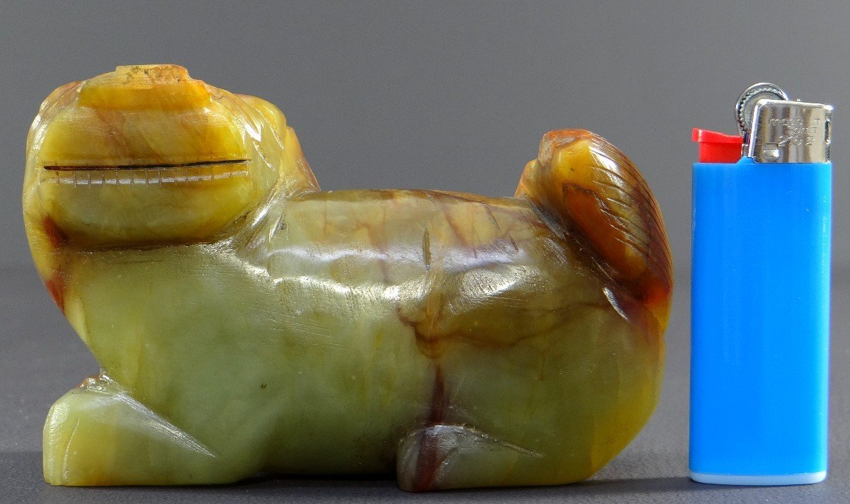 China, First Half Of The 20th Century, Small Buddhist Lion Statuette In Carved Jade. -photo-4