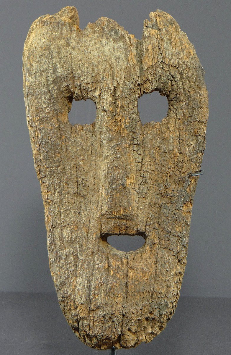 Indonesia, Island Of Timor, 19th Century, Old Anthropomorphic Mask In Very Eroded Wood. 