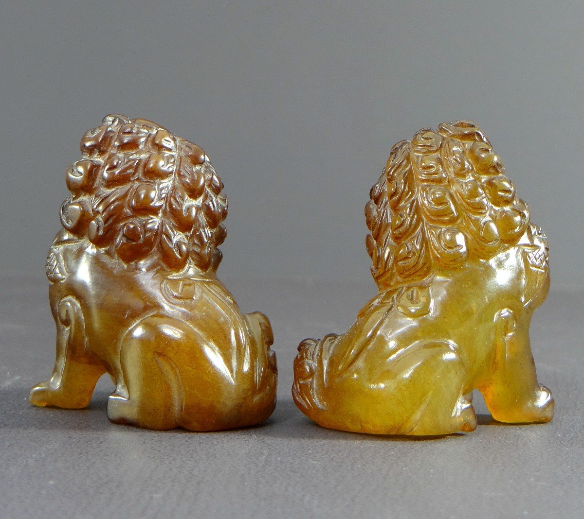 China, Mid-20th Century, Pair Of Fo Dogs In Hard Stone In The Spirit Of Agate.-photo-1