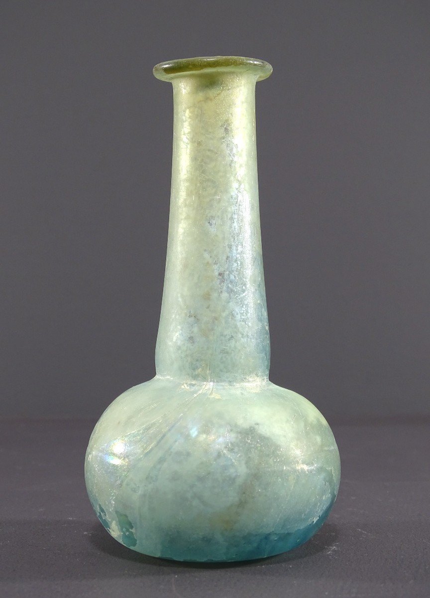 Rome, 3rd Century Ad, Balsam Jar In Iridescent Blown Glass With An Elongated Neck.-photo-1