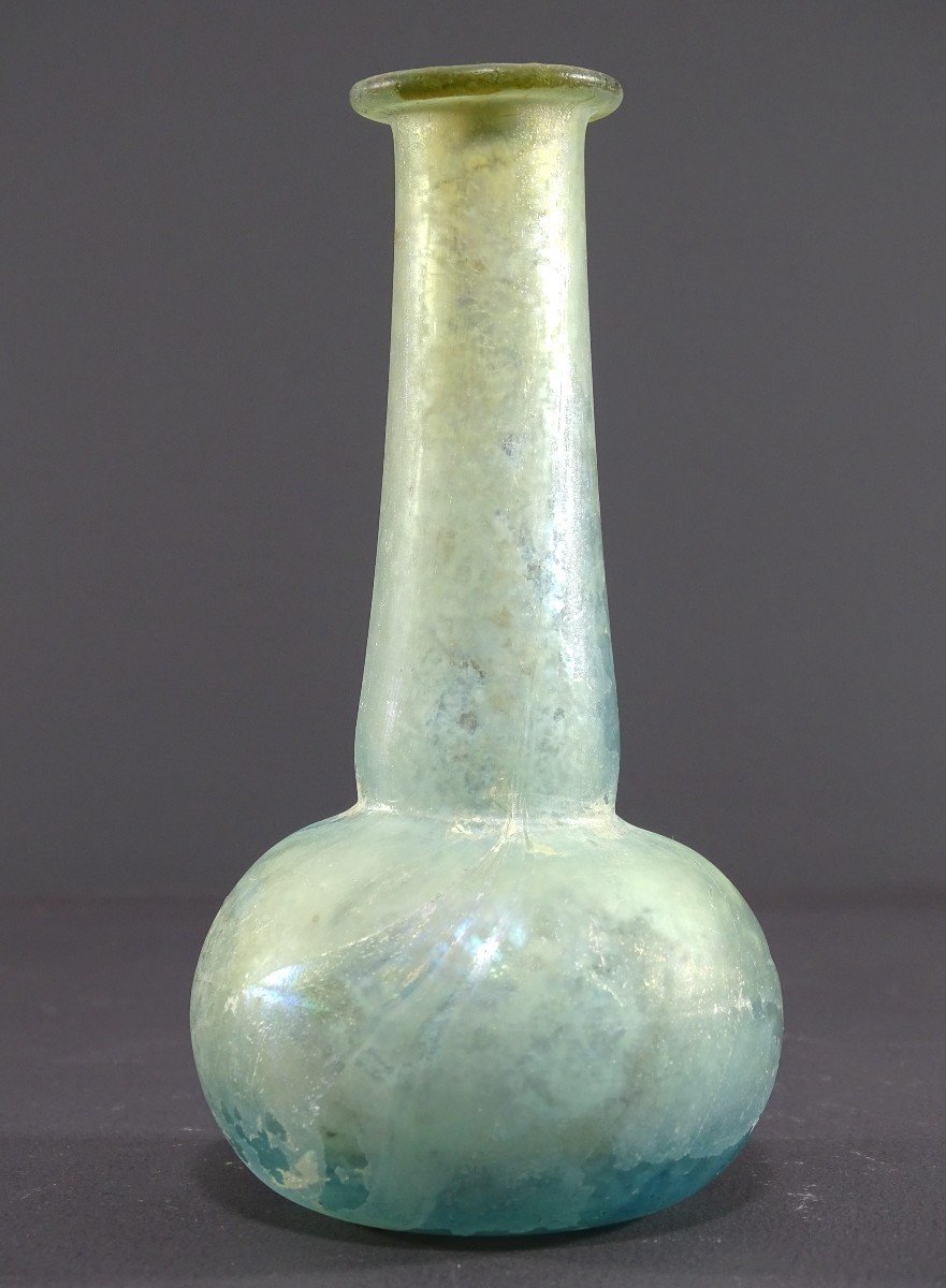 Rome, 3rd Century Ad, Balsam Jar In Iridescent Blown Glass With An Elongated Neck.