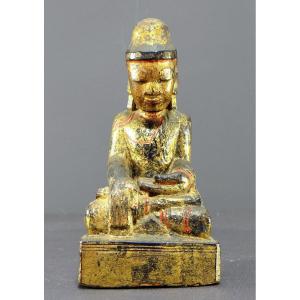 Burma, 19th Century, Mandalay Buddha In Carved And Gilded Wood On A Black Lacquer Background.