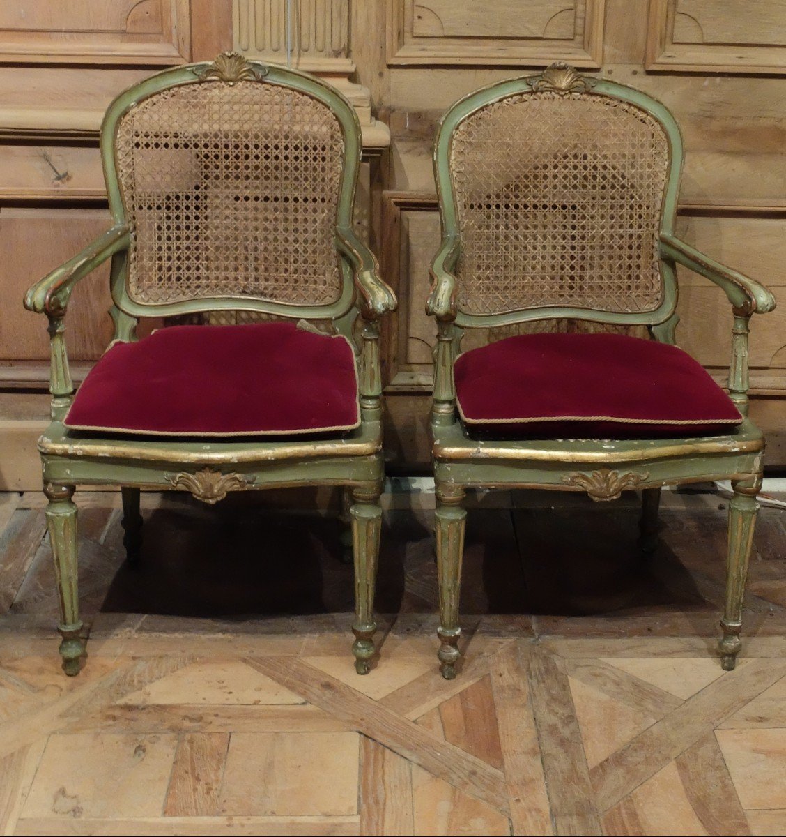 Pair Of Cane Armchairs In Gold Rechampi Lacquered Wood. Italy 18th Century Period.