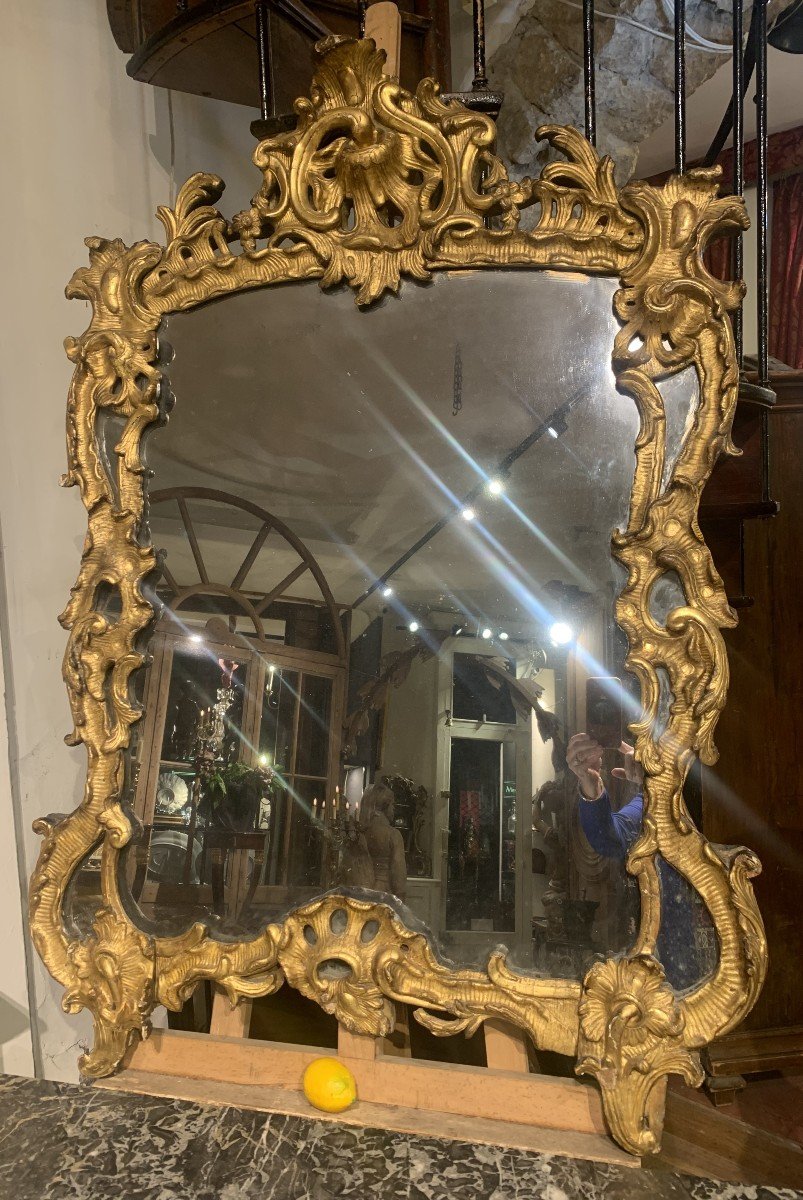 Beautiful Carved And Gilded Wooden Mirror With Glazing Beads. South Of France, 18th Century.