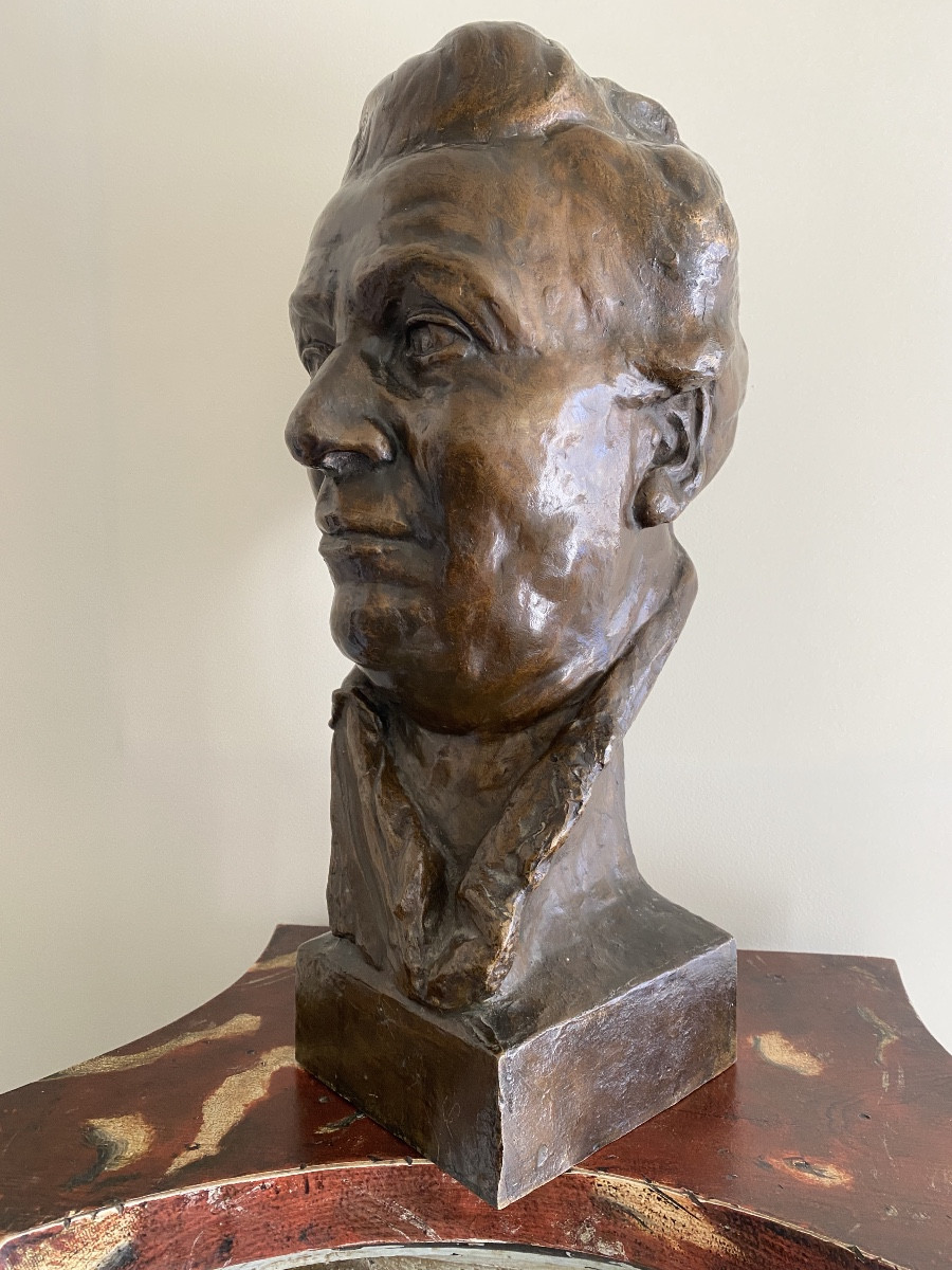 Bronze Sculpture Of A Man's Head With A Bun-photo-4