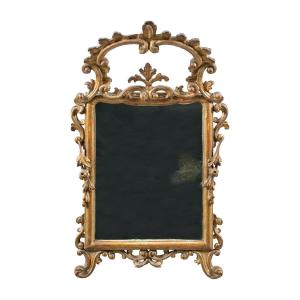 Carved And Gilded Wooden Mirror. Italy, 18th Century.