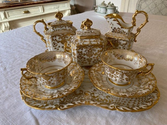 Head To Head Coffee Service In White And Golden Porcelain