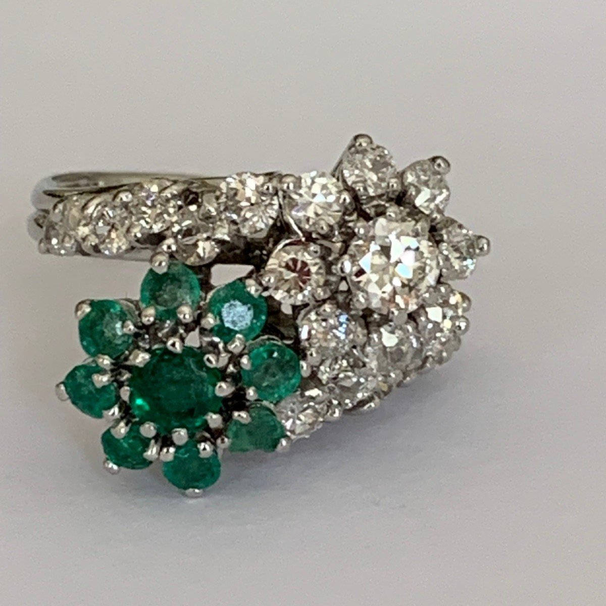 3449- Toi & Moi Platinum Diamonds Emeralds Ring
